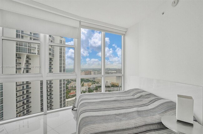Building Photo - 18201 Collins Ave