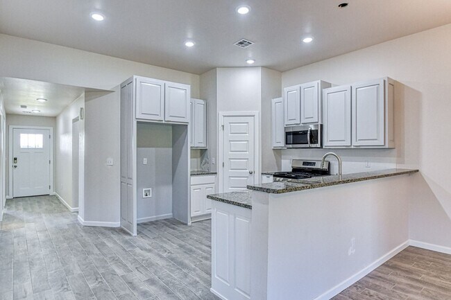 Building Photo - Brand New Construction! Lawn care provided!