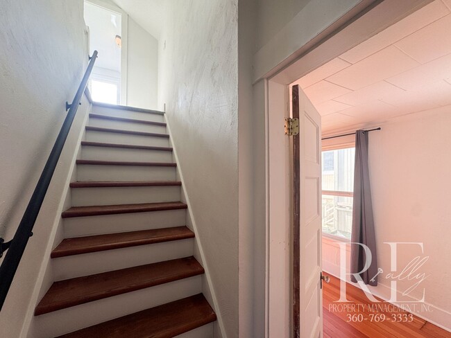 Building Photo - Light-Filled Home with Vaulted Ceilings, Bonus Basement & Walkable Location