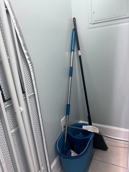 Spin mop & bucket, broom & dustpan - 10625 Front Beach Rd