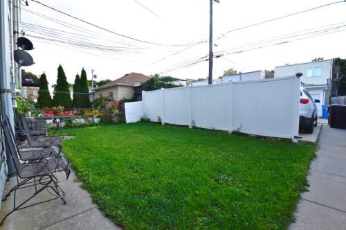 Backyard greenery/1 parking space available in back - 3324 N Hamlin Ave