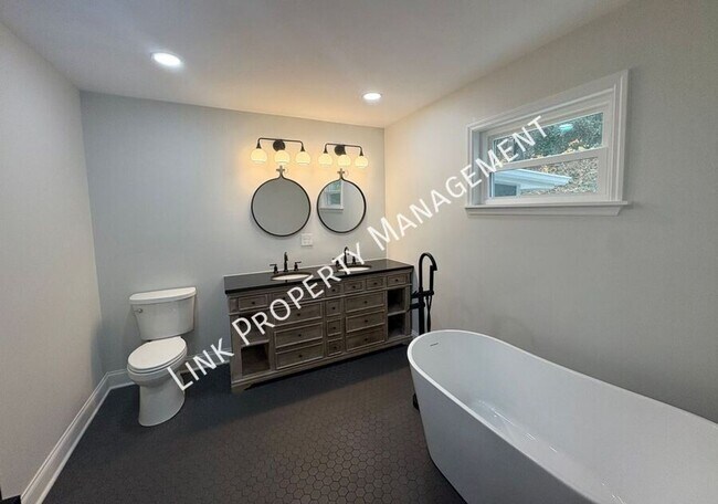 Building Photo - JUST REDUCE!  Sophisticated Tri-Level Home in Stuart Heights — Modern Comfort & Timeless Charming...