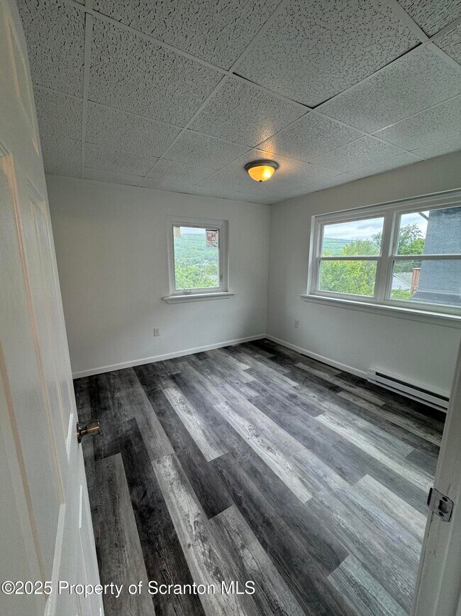 Building Photo - 100 N Van Buren Ave