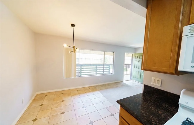 Building Photo - WELL MAINTAINED CONDO AT CREEKSIDE VILLAGE!