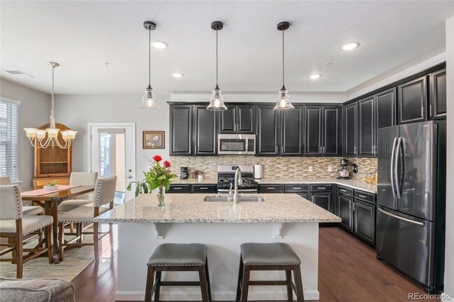 Building Photo - Gorgeous ground level Condo with Detached Garage | Pets Welcome | Detached Garage Included