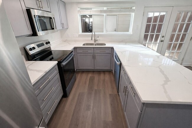 Building Photo - Stylish 2-Bedroom Townhome with Terrace & Resort-Style Amenities in Grand Prairie