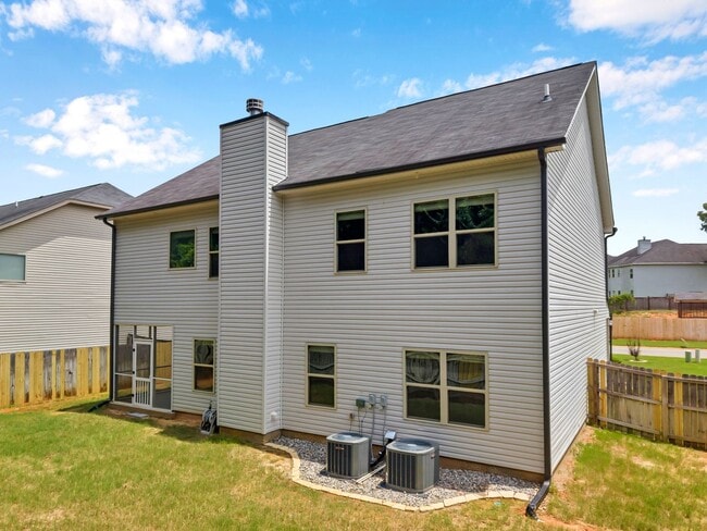 Building Photo - Spacious 4BR Home with Fenced Yard & Community Pool
