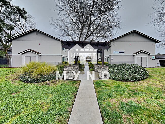 Building Photo - 6500 Country Club Dr Apt 7