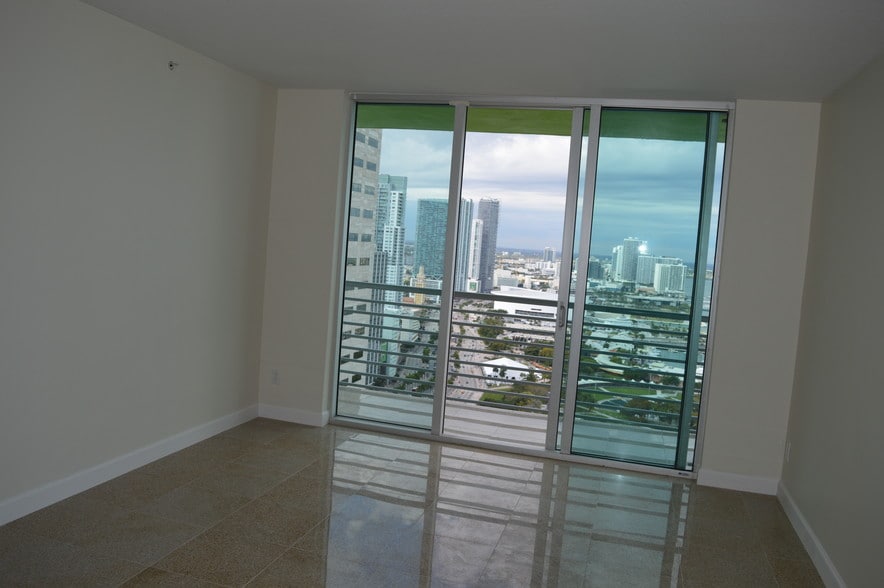 LIVING ROOM WITH BALCONY - 3530 Biscayne Blvd