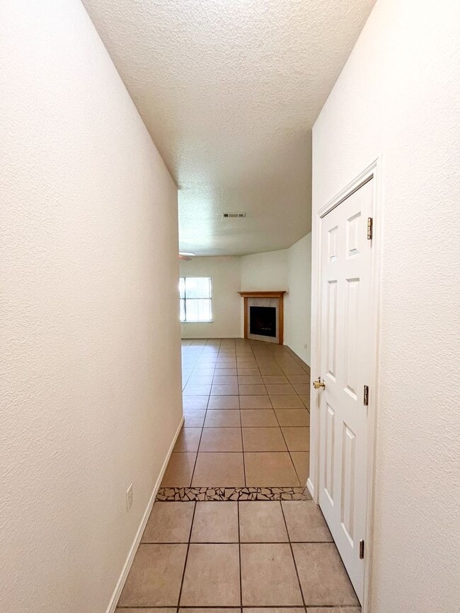 Building Photo - Available NOW!!!! Open floor plan features living room with fireplace, dining area, and large kit...