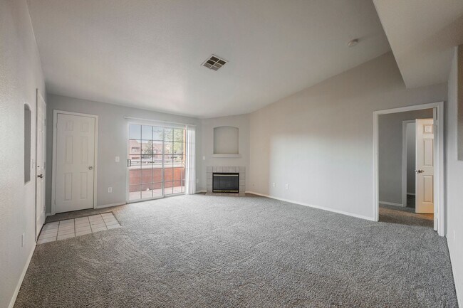 Building Photo - Like-New 2BR/2BA Condo in Gated Manzanita Community – Vaulted Ceilings & Fireplace!
