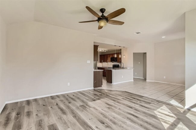 Building Photo - This well-maintained 4 bedroom home is located in a quiet neighborhood that has a community park ...