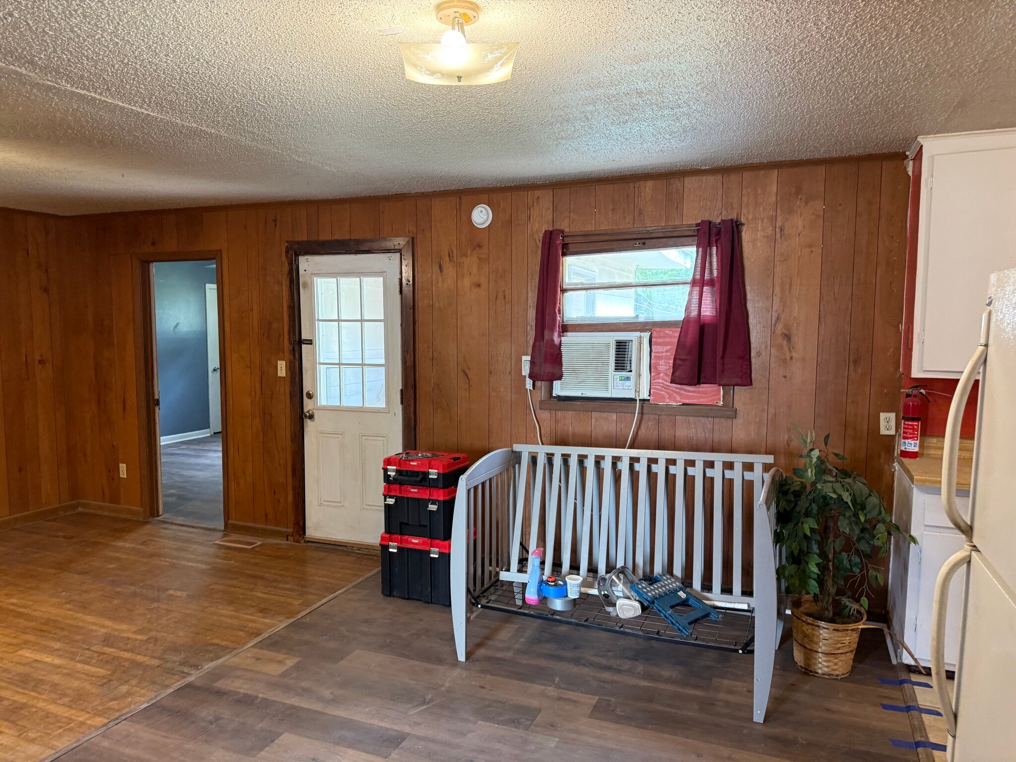 Back door to patio from dining room. Window a/c--summer/winter - 2410 Forest Home Rd