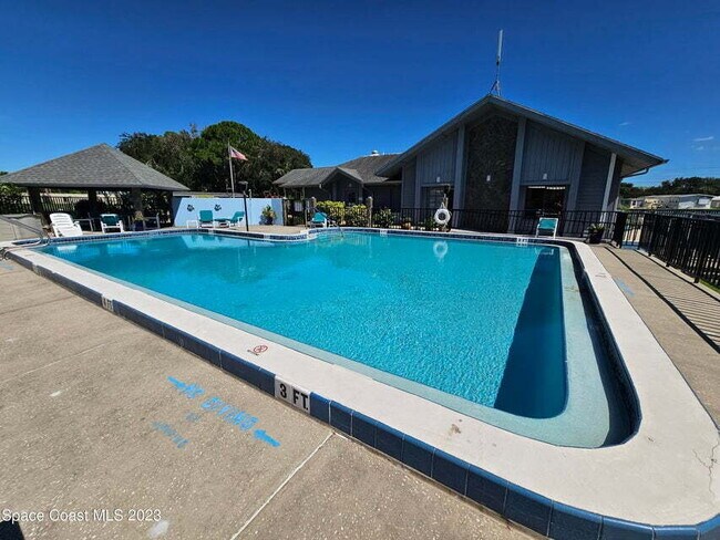 Building Photo - 55+ in Quiet Gated Community