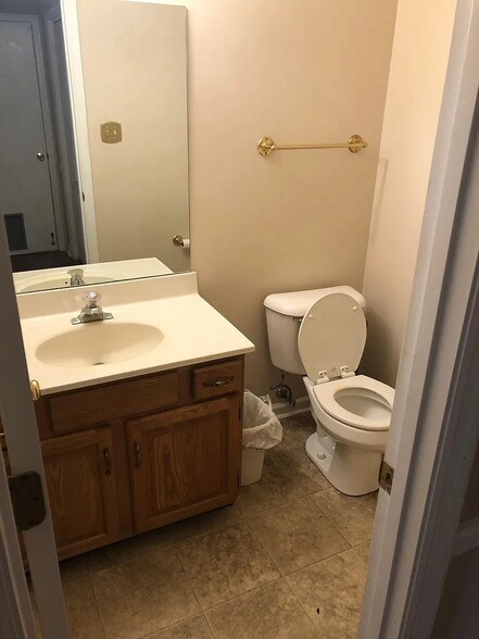 Downstairs half bathroom - 8600 Old Carriage Ct