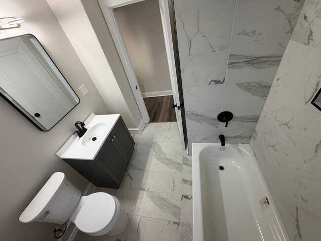 Building Photo - Spacious 5BR/2BA Home with Basement & Off-Street Parking