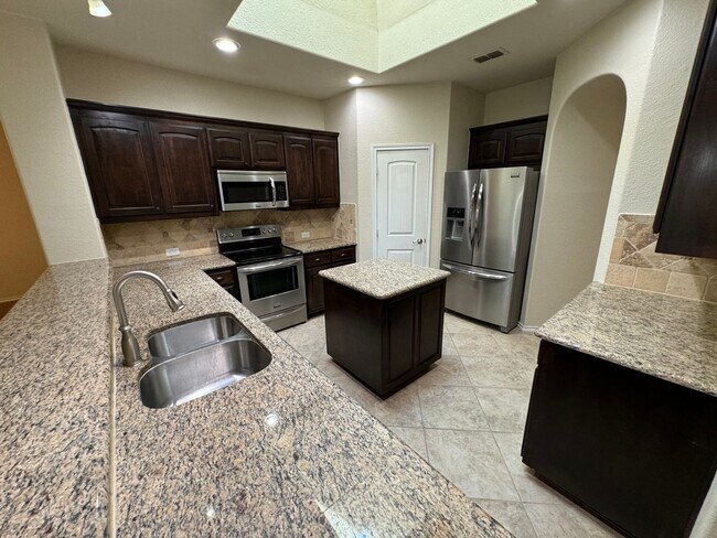 Building Photo - Argyle ISD Gem with Huge Private Backyard & Open Floorplan