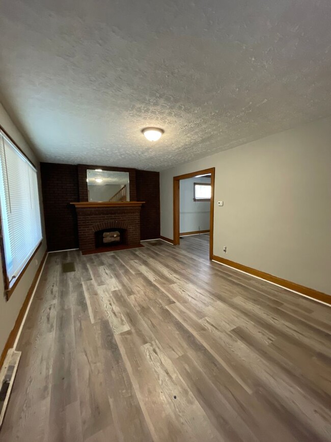 Building Photo - Introducing a charming Three Bedroom, One ...