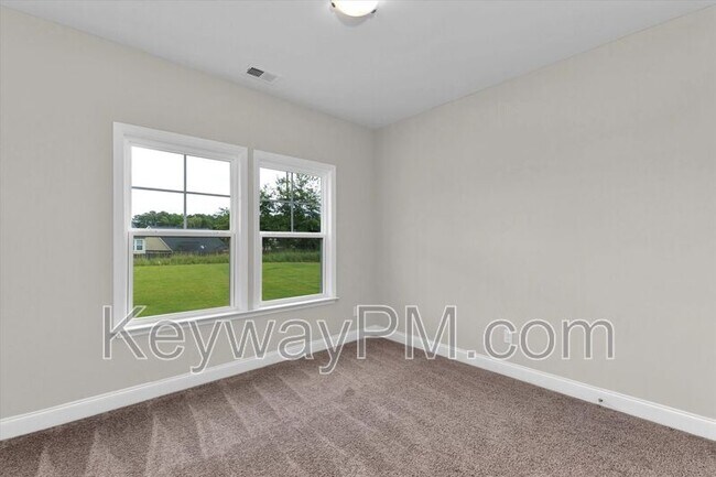 Building Photo - 5995 Big Pond Trl