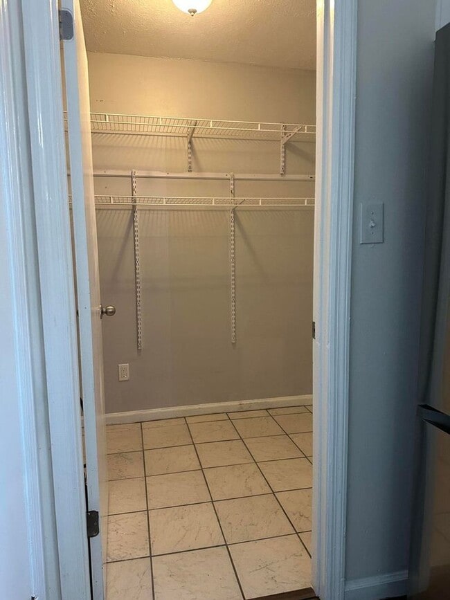 Building Photo - Move-In Ready Corner-Lot Home with Wraparound Porch Near Fort Eisenhower