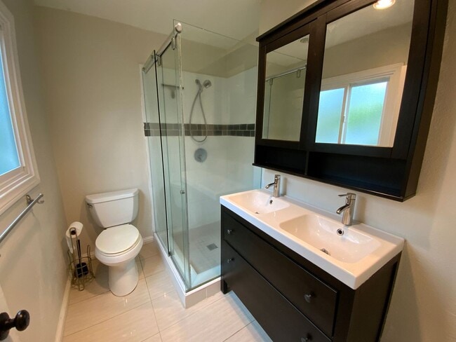 Building Photo - Spacious 3BD Home with Large Backyard, Quartz Counters & 2-Car Garage