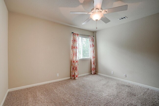 Building Photo - Bright & Roomy 4BR • 2.5BA • Two-Level Living