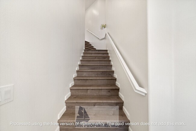 Building Photo - Welcome to this stunning 2-bedroom condo in gated community