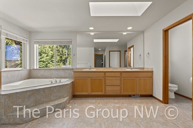 Building Photo - Beautiful Central Bothell Home. Great Floor Plan! Open Lvg Spaces, Office, Bonus Room  + XL Bedro...
