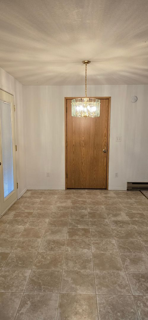 Building Photo - Four Bedroom Home with Fenced Yard in Green