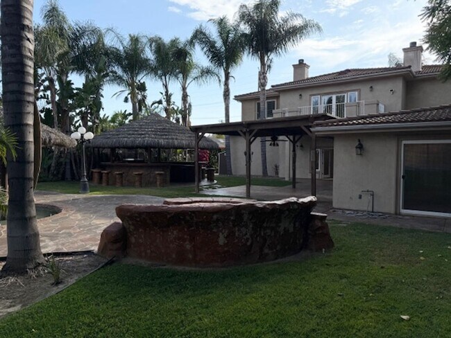 Building Photo - Gated estate with a backyard oasis