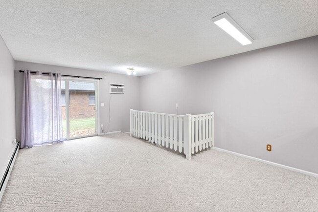 Building Photo - Spacious 2-Bedroom Condo with Garage and Basement