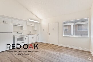 Building Photo - Charming One Bedroom with Sunlit Open Floo...