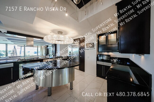 Building Photo - 7157 E Rancho Vista Dr
