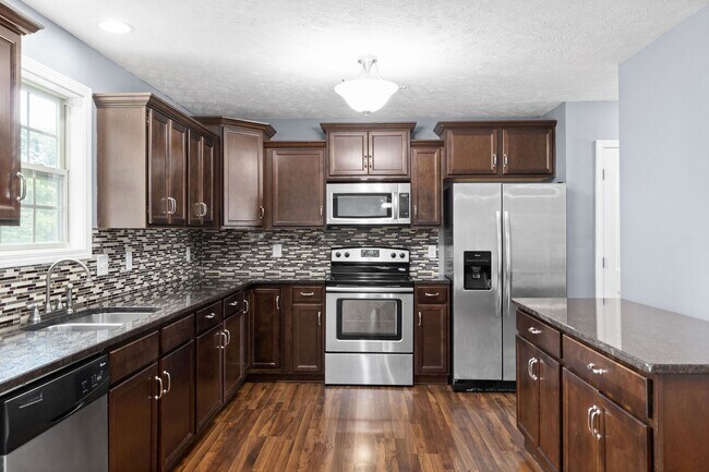 Building Photo - Pet Friendly Four Bedroom!