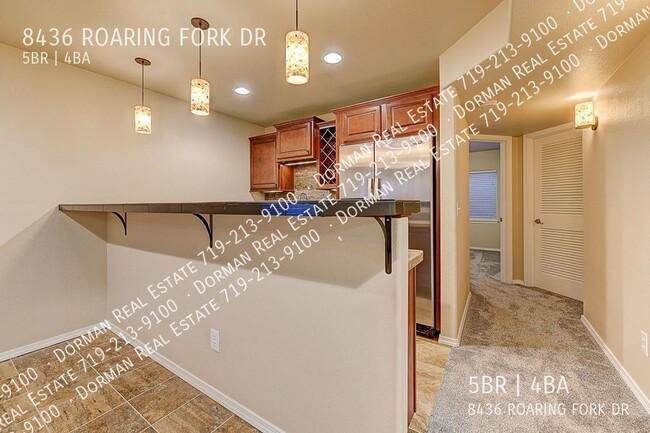 Building Photo - 8436 Roaring Fork Dr