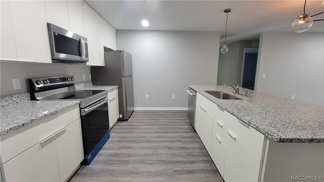 Building Photo - 7043 N Outrigger Terrace