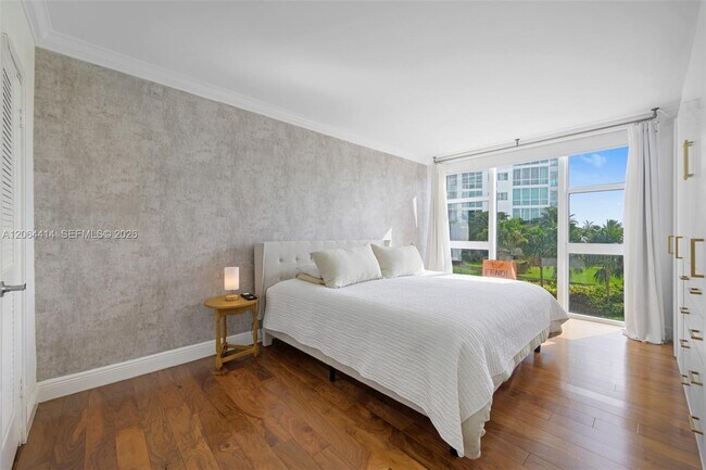 Building Photo - 10275 Collins Ave