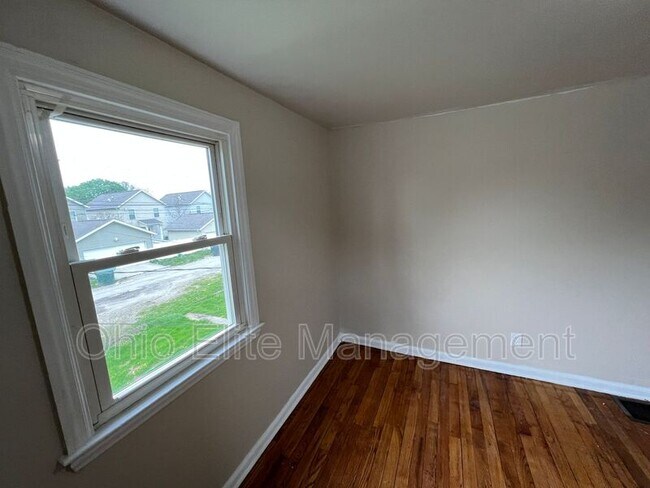 Building Photo - 1310 E 25th Ave