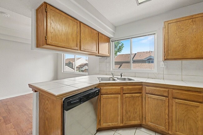 Building Photo - Beautiful 2BR Townhome in Gated Community with 2-Car Garage