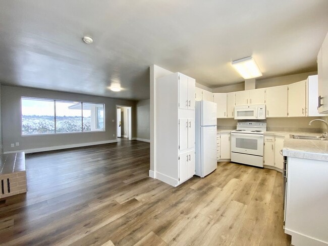 Building Photo - Renovated Home Surrounded By Scenic Orchard Bliss