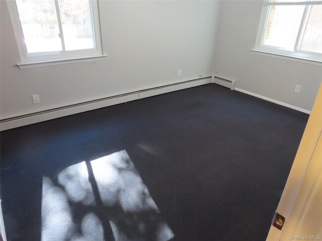 Building Photo - 1210 Smithtown Ave