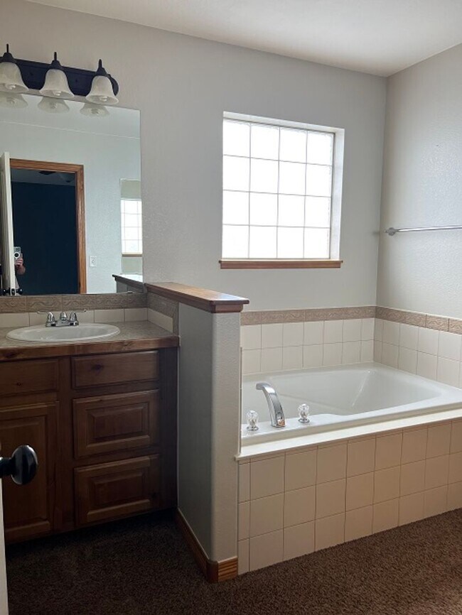 Building Photo - Spacious 5-Bedroom Home with Finished Basement and 3-Car Garage in Wellington