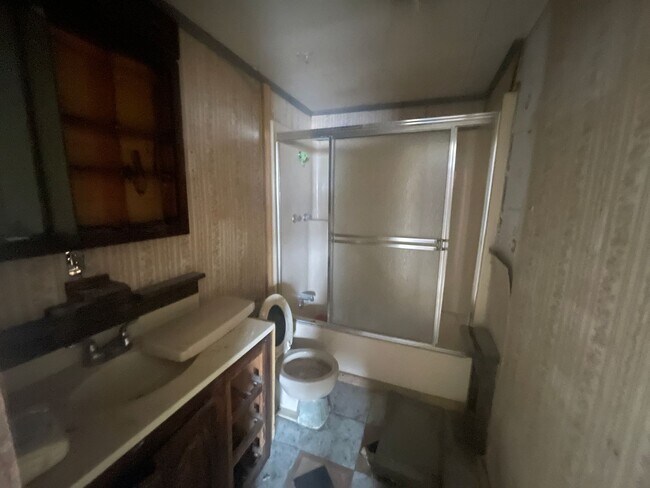 Building Photo - WELLSVILLE - 3 BR split level with Attache...