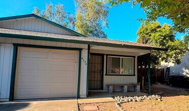 Building Photo - Charming 2-Bedroom Duplex with Large Fenced Yard & Attached Garage