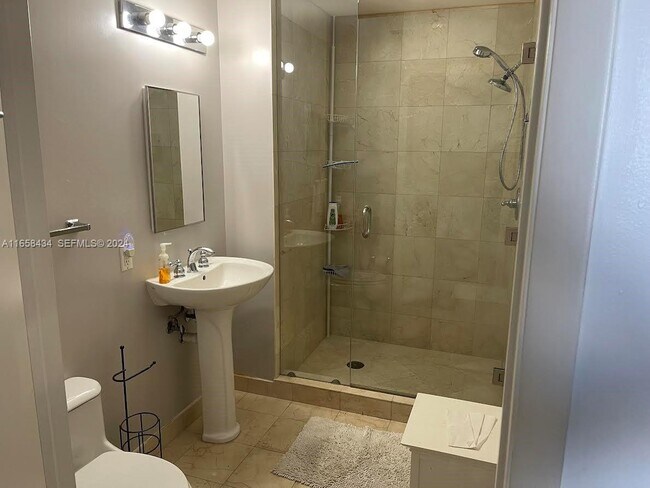 Building Photo - 6365 Collins Ave