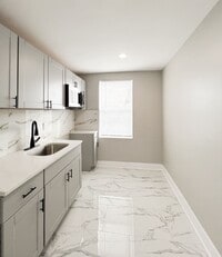 Building Photo - 5548 Woodland Ave