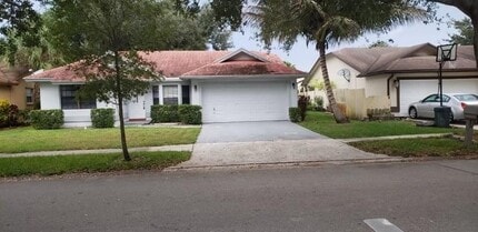 Building Photo - 9555 NW 25th Ct
