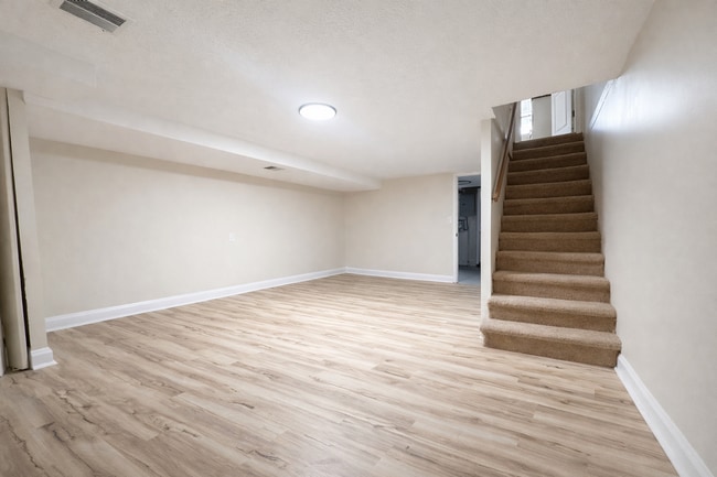 Building Photo - Updated 3BR Home with Finished Basement, & Fenced Yard