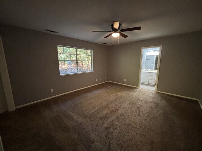 Building Photo - 3 bedroom home on community pond - great fishing!