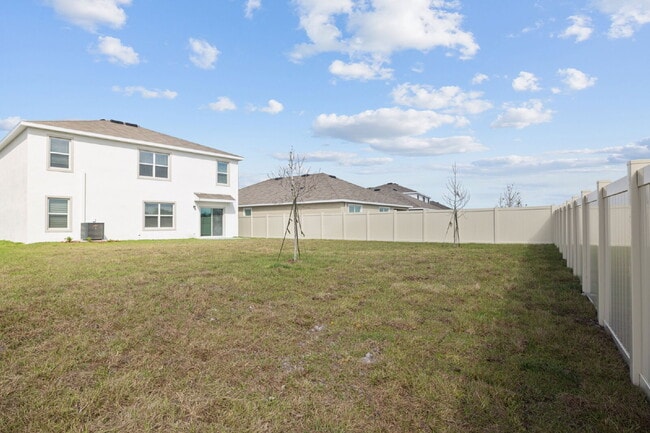 Building Photo - "Spacious 5-Bedroom Retreat with 3 Full Baths in Epperson Lagoon Wesley Chapel – 2,601 Sq. Ft. of...